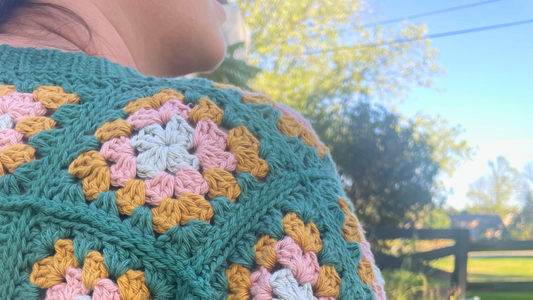 A closeup of Mallory’s attention to detail in her granny square cardigan.